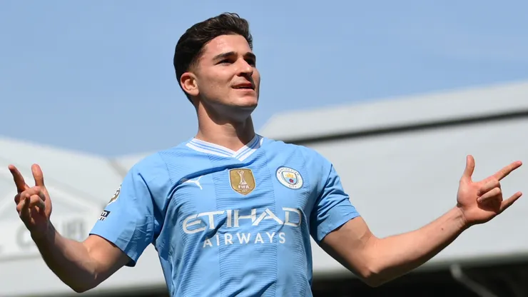 Julian Alvarez of Manchester City celebrates scoring his team's fourth goal during the Premier League match between Fulham FC and Manchester City at Craven Cottage on May 11, 2024 in London, England.