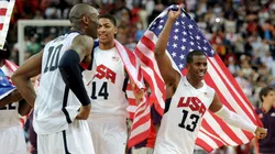 Team mates Kobe Bryant #10 of the United States, Anthony Davis #14 of the United States, and Chris Paul #13 of the United States celebrate winning the Men's Basketball gold medal game between the United States and Spain