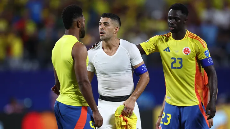 Miguel Borja confronts Luis Suarez of Uruguay after the CONMEBOL Copa America 2024 semifinal match between Uruguay and Colombia.