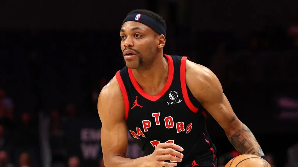 Bruce Brown #11 of the Toronto Raptors dribbles during the first half of the game against the Charlotte Hornets at Spectrum Center on February 07, 2024 in Charlotte, North Carolina.