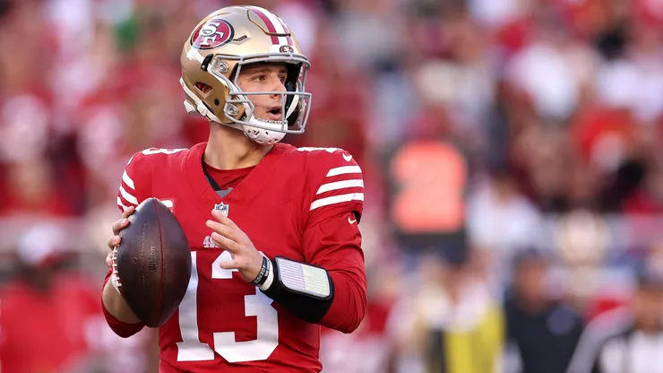 Brock Purdy #13 of the San Francisco 49ers drops back to pass the ball against the Detroit Lions in the NFC Championship Game at Levi's Stadium on January 28, 2024 in Santa Clara, California.
