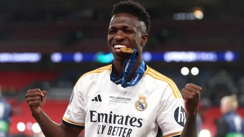 Vinicius Junior of Real Madrid bites his winners medal following victory in the UEFA Champions League 2023/24 Final match between Borussia Dortmund and Real Madrid CF.