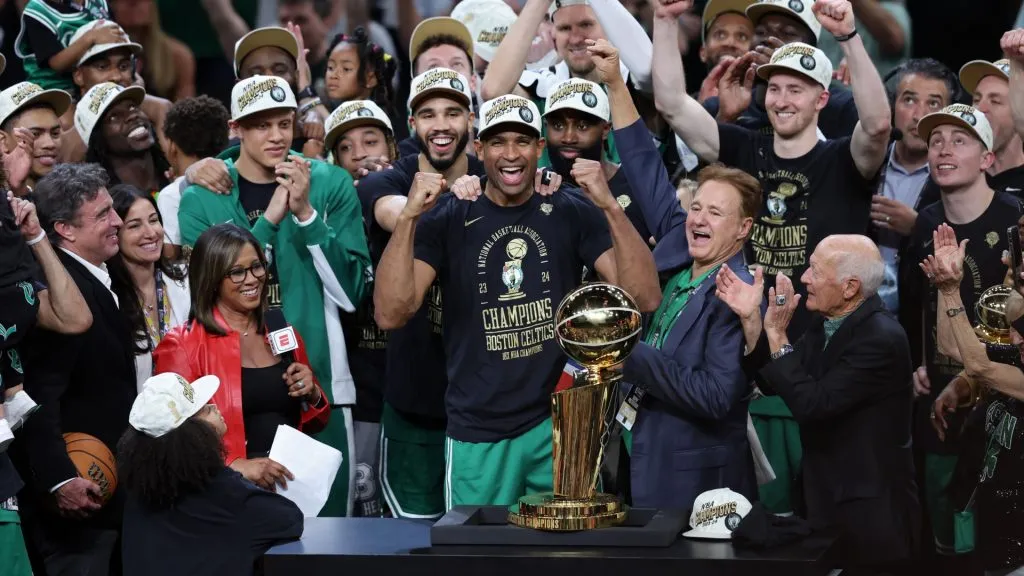 Jayson Tatum #0, Al Horford #42, Jaylen Brown #7 of the Boston Celtics celebrate after Boston’s 106-88 win against the Dallas Mavericks in Game Five of the 2024 NBA Finals at TD Garden on June 17, 2024 in Boston, Massachusetts. Photo by Adam Glanzman/Getty Images