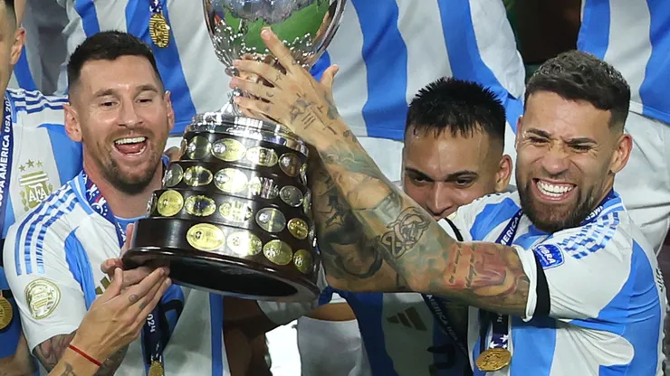 Lionel Messi of Argentina celebrates with the trophy after the team's victory during the CONMEBOL Copa America 2024.