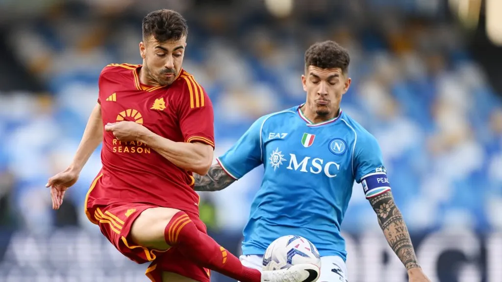 Stephan El Shaarawy of AS Roma battles for possession with Giovanni Di Lorenzo of SSC Napoli during the Serie A TIM match between SSC Napoli and AS Roma - Serie A TIM at Stadio Diego Armando Maradona on April 28, 2024 in Naples, Italy.