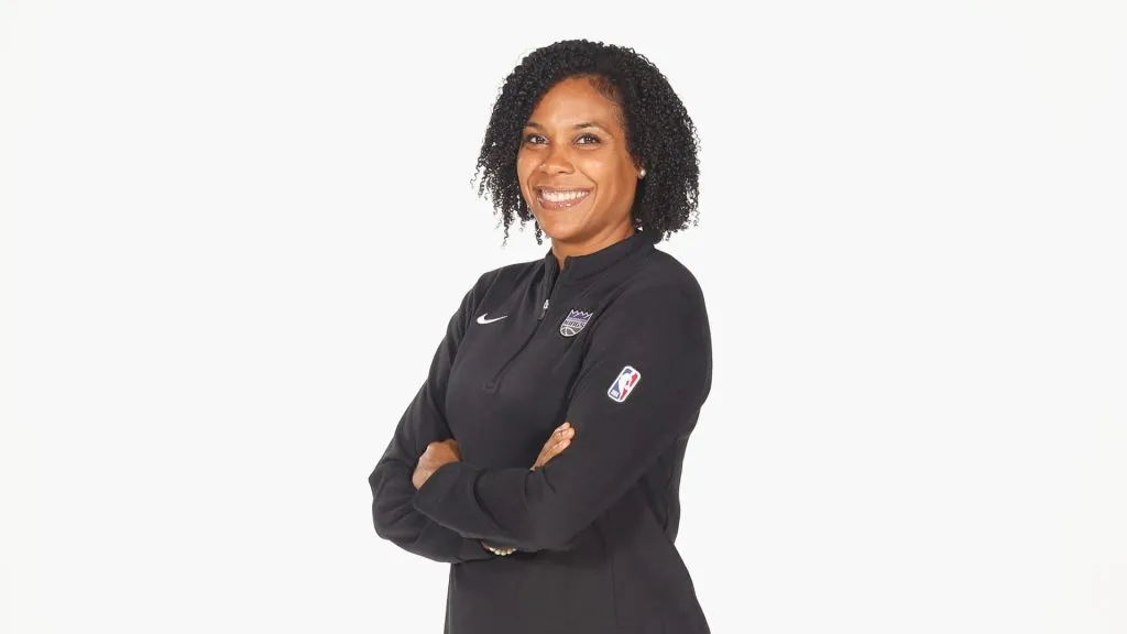  Sacramento Kings assistant coach Lindsey Harding poses for a photo at Sacramento Kings Practice Facility on October 02, 2023 in Sacramento, California.
