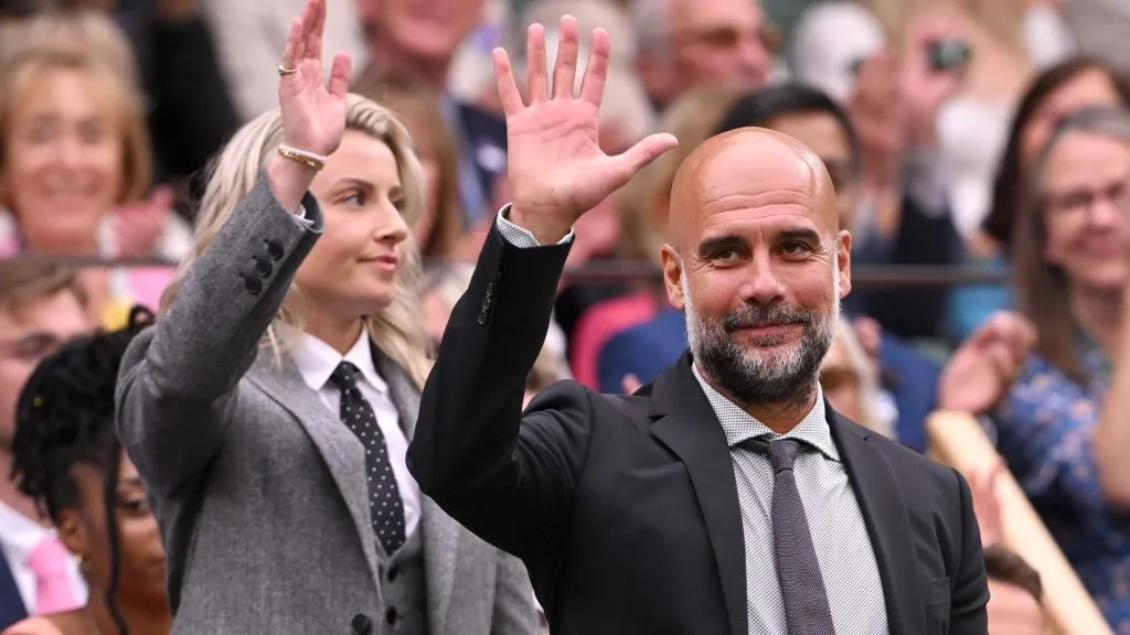 Leah Williamson and Pep Guardiola wave from the Royal Box ahead of the Gentlemen’s Singles third round match between Cameron Norrie of Great Britain and Alexander Zverev of Germany during day six of The Championships Wimbledon 2024 at All England Lawn Tennis and Croquet Club on July 06, 2024 in London, England. Photo by Mike Hewitt/Getty Images