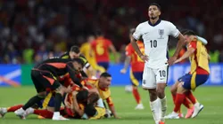 Jude Bellingham of England looks dejected as players of Spain celebrates after the UEFA EURO 2024 final match between Spain and England at Olympiastadion on July 14, 2024 in Berlin, Germany.