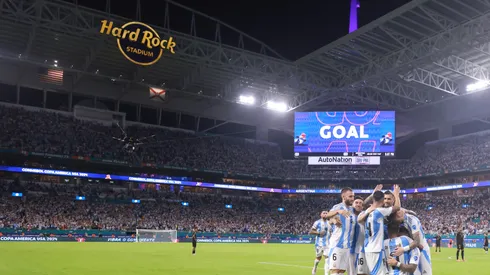 Lautaro Martinez of Argentina celebrates with teammates after scoring the team's first goal during the CONMEBOL Copa America 2024 Group A match between Argentina and Peru at Hard Rock Stadium