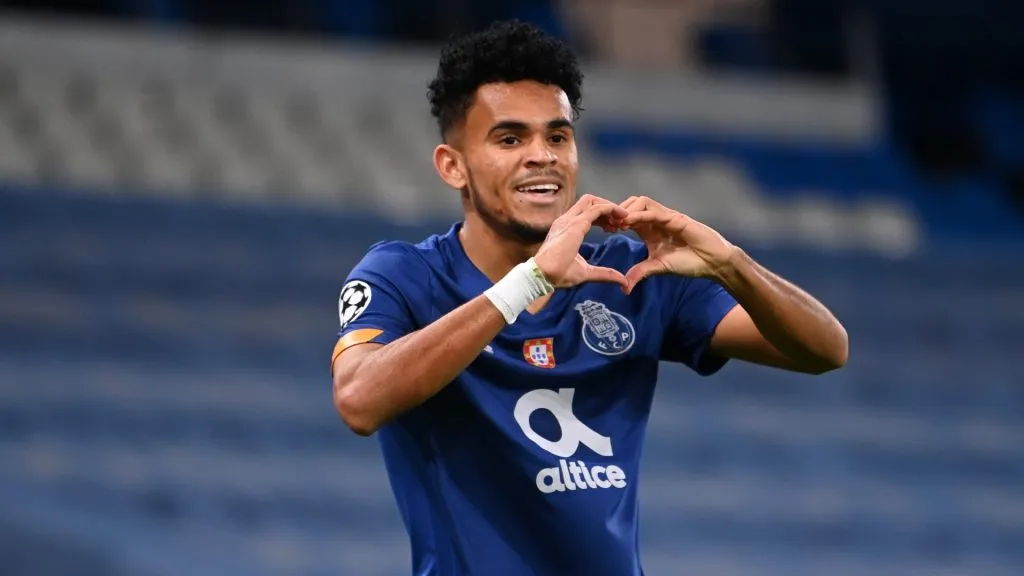 Luis Diaz of FC Porto celebrates after scoring his team’s first goal during the UEFA Champions League Group C stage match between Manchester City and FC Porto at Etihad Stadium on October 21, 2020 in Manchester, England. Sporting stadiums around the UK remain under strict restrictions due to the Coronavirus Pandemic as Government social distancing laws prohibit fans inside venues resulting in games being played behind closed doors. (Photo by Laurence Griffiths/Getty Images)