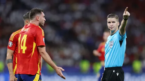 Referee Francois Letexier gestures as he is confronted by Aymeric Laporte of Spain during the UEFA EURO 2024 final match between Spain and England at Olympiastadion on July 14, 2024 in Berlin, Germany.