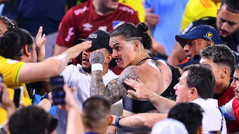 Darwin Nunez of Uruguay fights with Fans o Aficion during the CONMEBOL Copa America 2024 Semi-final match between Uruguay and Colombia, at Bank of America Stadium, on July 10, 2024 in Charlotte, North Carolina, United States.