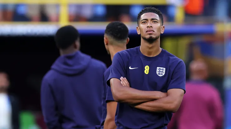 Jude Bellingham of England looks on as he inspects the pitch prior to the UEFA EURO 2024 semi-final match between Netherlands and England at Football Stadium Dortmund.