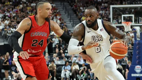 LeBron James #6 of the United States drives against Dillon Brooks #24 of Canada in the second half of their exhibition game ahead of the Paris Olympic Games at T-Mobile Arena on July 10, 2024 in Las Vegas, Nevada. The United States defeated Canada 86-72.