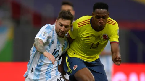 Lionel Messi of Argentina competes for the ball with Yerry Mina of Colombia during a semi-final match of Copa America Brazil 2021 between Argentina and Colombia at Mane Garrincha Stadium on July 06, 2021 in Brasilia, Brazil.