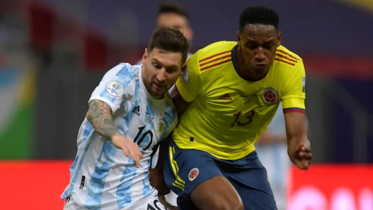 Lionel Messi of Argentina competes for the ball with Yerry Mina of Colombia during a semi-final match of Copa America Brazil 2021 between Argentina and Colombia at Mane Garrincha Stadium on July 06, 2021 in Brasilia, Brazil.