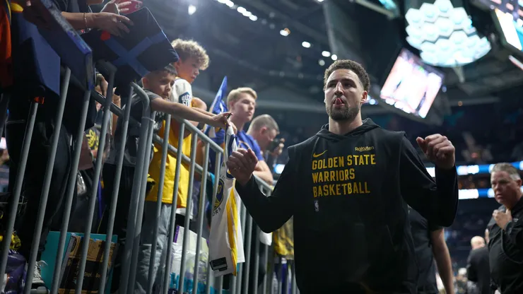 Klay Thompson #11 of the Golden State Warriors leaves the court after warming up prior to the game against the Charlotte Hornets at Spectrum Center on March 29, 2024 in Charlotte, North Carolina.