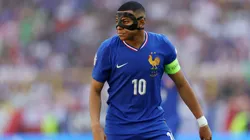 Kylian Mbappe of France looks on, whilst wearing a Black Protectice Face Mask after breaking his nose during the Group D fixture against Austria