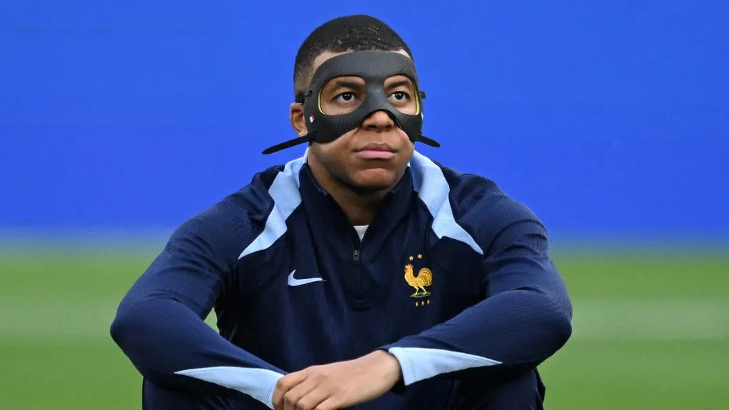 Kylian Mbappe of France looks on with his face mask during the warm up prior to the UEFA EURO 2024 group stage match between Netherlands and France. Clive Mason/Getty Images