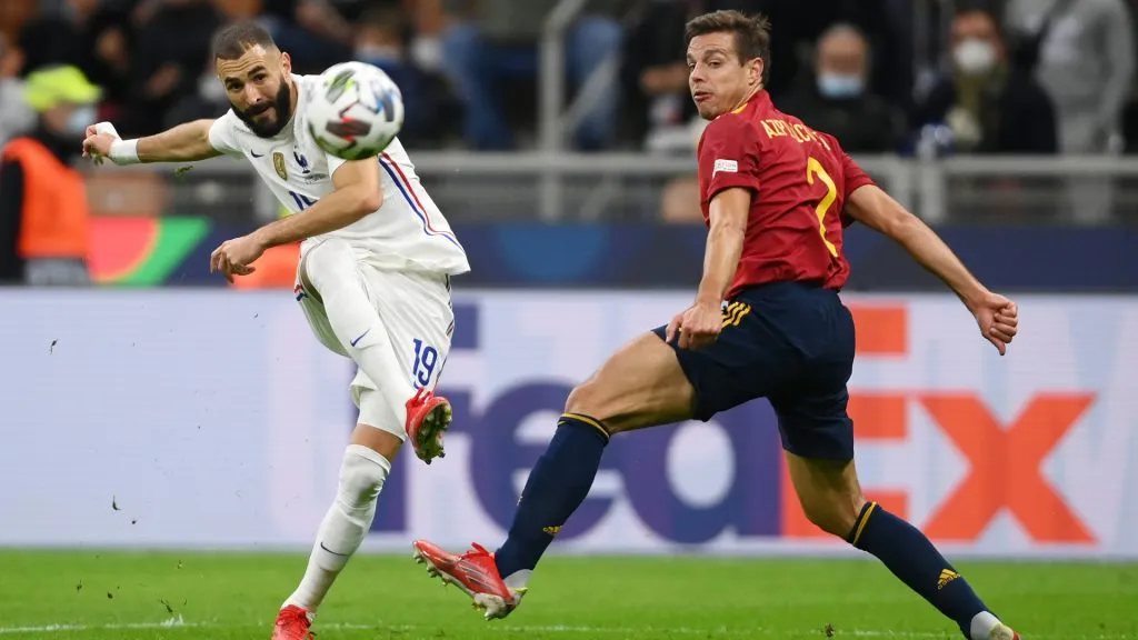 Karim Benzema of France scores their side’s first goal whilst under pressure from Cesar Azpilicueta of Spain during the UEFA Nations League 2021 Final match between Spain and France. Mike Hewitt/Getty Images