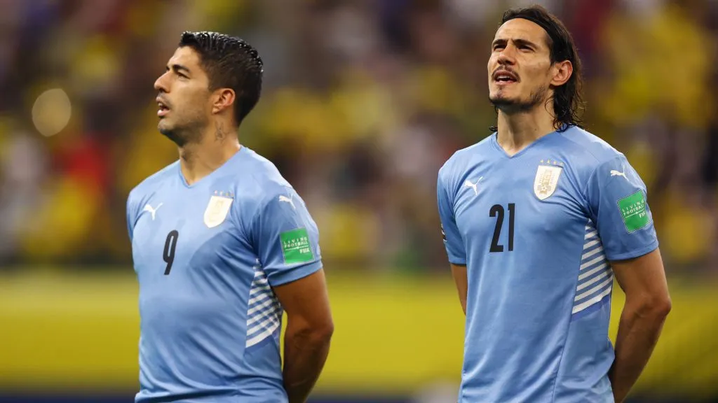 Luis Suarez and Edinson Cavani of Uruguay sing the national anthem prior to a match between Brazil and Uruguay. Buda Mendes/Getty Images
