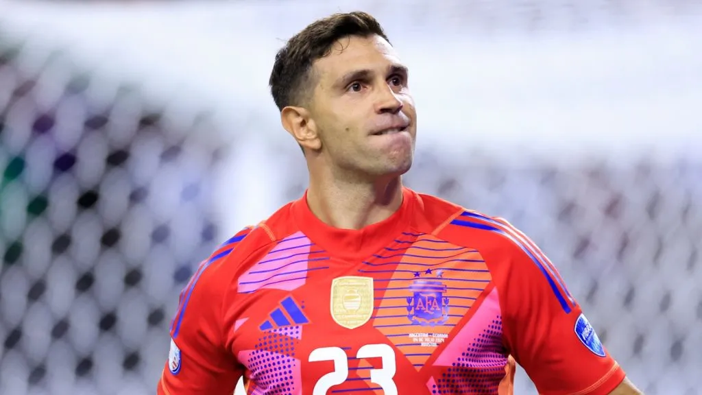 Emiliano Martinez of Argentina saves the first penalty from Ecuador in the penalty shoot out during the CONMEBOL Copa America 2024 quarter-final match between Argentina and Ecuador at NRG Stadium on July 04, 2024 in Houston, Texas.