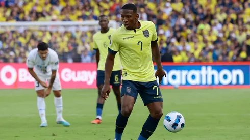 Pervis Estupiñan of Ecuador controls the ball during a FIFA World Cup 2026 Qualifier match between Ecuador and Uruguay.