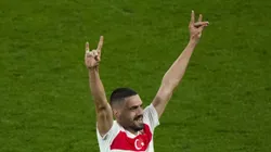 Merih Demiral makes hand gesture after scoring the second goal of his team