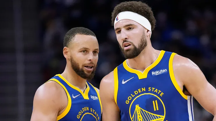Klay Thompson #11 and Stephen Curry #30 of the Golden State Warriors talks with each other against Indiana Pacers.