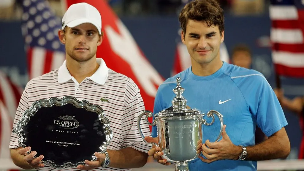 Andy Roddick and Roger Federer of Switzerland pose together after Federer defeated Roddick in the men’s final of the U.S. Open. Al Bello/Getty Images