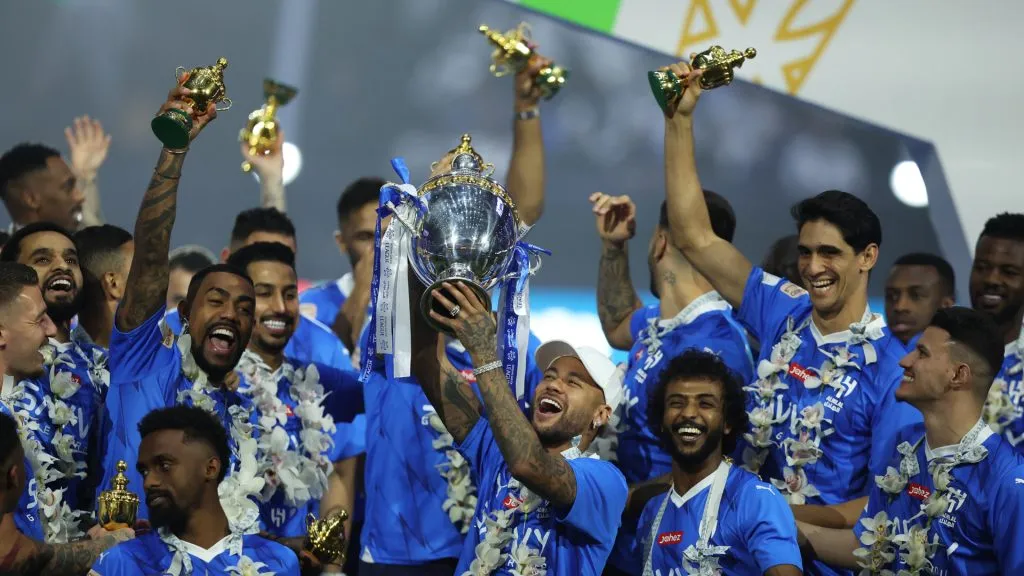 Neymar Jr of Al Hilal celebrates with the trophy during the Saudi Pro League Trophy. Yasser Bakhsh/Getty Images