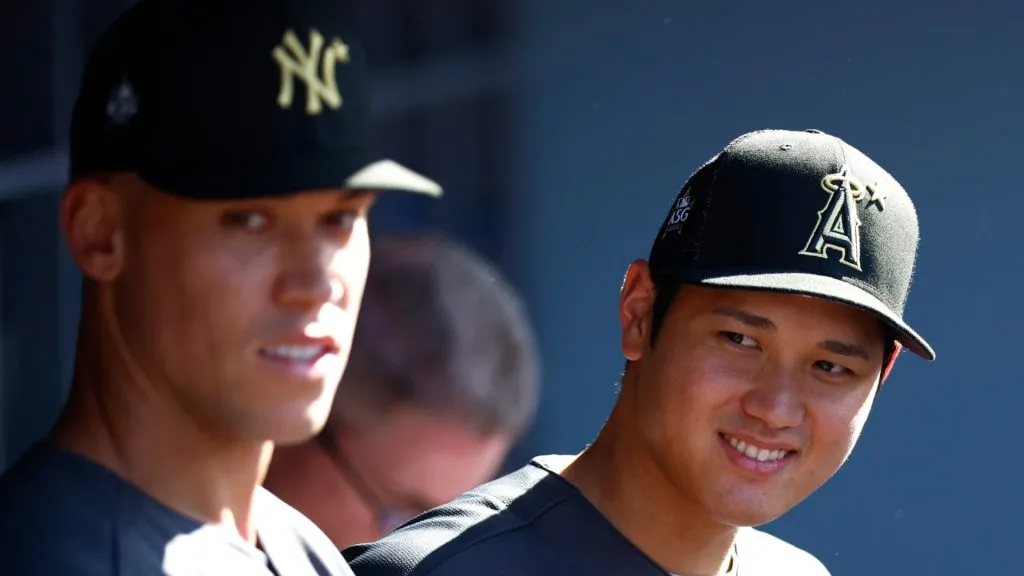Aaron Judge #99 of the New York Yankees and Shohei Ohtani #17 of the Los Angeles Angels look on from the dugout before the 92nd MLB All-Star Game at Dodger Stadium. (Photo by Ronald Martinez/Getty Images)