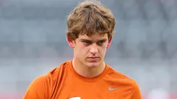 Arch Manning #16 of the Texas Longhorns warms-up prior to a game against the Alabama Crimson Tide at Bryant-Denny Stadium on September 09, 2023 in Tuscaloosa, Alabama.