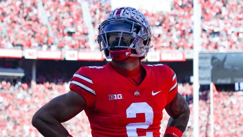 Emeka Egbuka #2 of the Ohio State Buckeyes poses after scoring a touchdown during the first quarter of a game against the Michigan Wolverines at Ohio Stadium on November 26, 2022 in Columbus, Ohio.