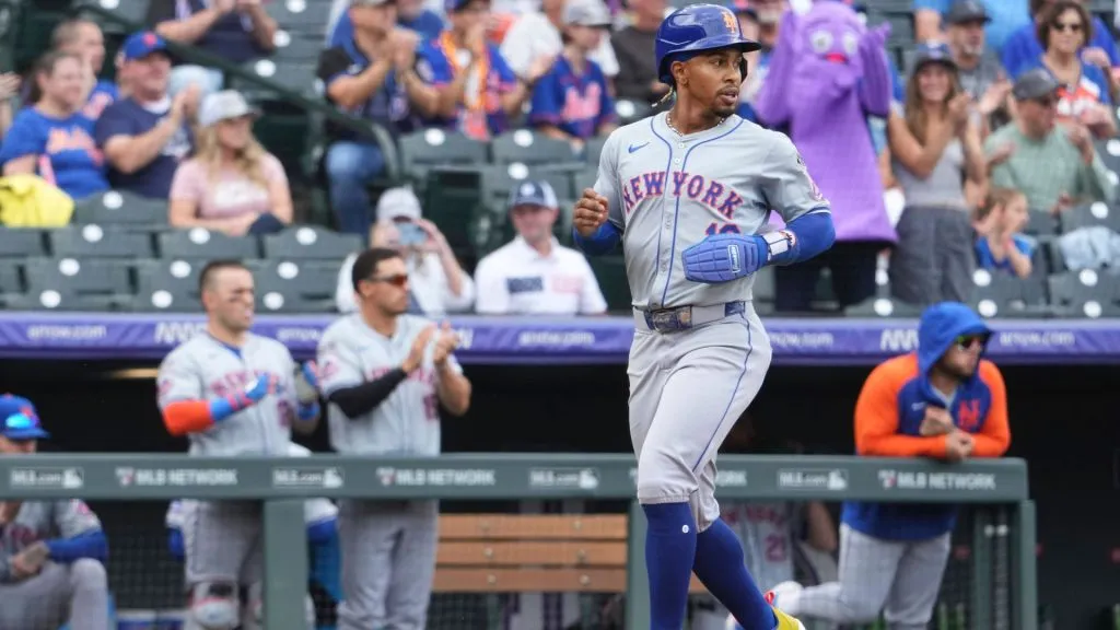 New York shortstop Francisco Lindor (12) scores a run during the game between the New York Mets and Colorado Rockies game held at Coors Field. IMAGO /&nbsp;ZUMA Press Wire