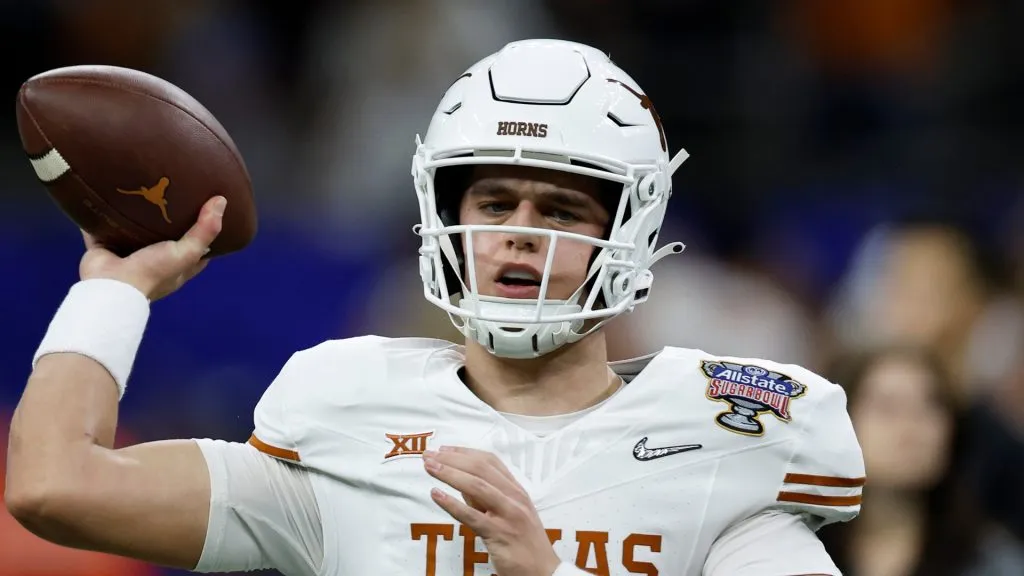 Arch Manning #16 of the Texas Longhorns warms up prior to playing against the Washington Huskies during the CFP Semifinal Allstate Sugar Bowl at Caesars Superdome on January 01, 2024 in New Orleans, Louisiana.