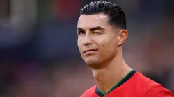 Cristiano Ronaldo of Portugal winks prior to the UEFA EURO 2024 quarter-final match between Portugal and France at Volksparkstadion on July 05, 2024 in Hamburg, Germany.