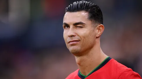 Cristiano Ronaldo of Portugal winks prior to the UEFA EURO 2024 quarter-final match between Portugal and France at Volksparkstadion on July 05, 2024 in Hamburg, Germany.