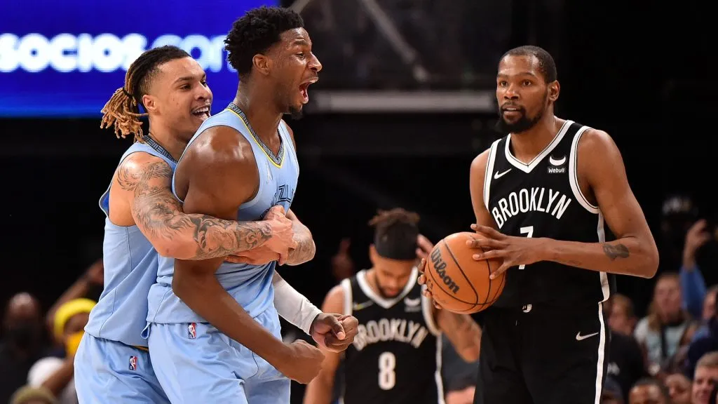 Jaren Jackson Jr. #13 of the Memphis Grizzlies celebrate as Kevin Durant #7 of the Brooklyn Nets looks. Justin Ford/Getty Images