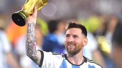 Lionel Messi of Argentina celebrates with the FIFA World Cup trophy