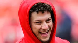 Patrick Mahomes #15 of the Kansas City Chiefs laughs at a teammates comment during pregame warmups prior to the game against theLos Angeles Chargers at Arrowhead Stadium on December 29, 2019 in Kansas City, Missouri.