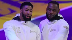 LeBron James #23 and Anthony Davis #3 of the Los Angeles Lakers pose with their rings during the 2020 NBA championship ring ceremony