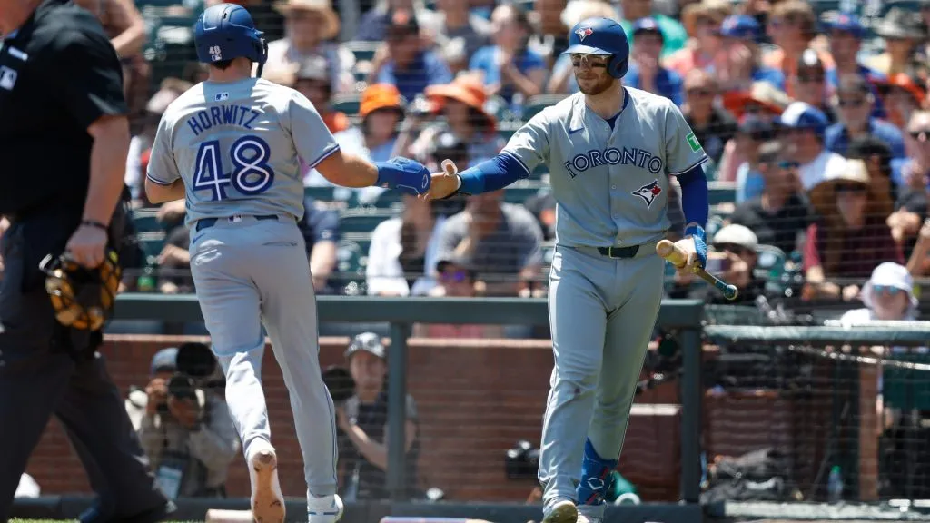 Spencer Horwitz #48 of the Toronto Blue Jays celebrates with Danny Jansen #9 after hitting a solo home run in the top of the first inning against the San Francisco Giants at Oracle Park. (Photo by Lachlan Cunningham/Getty Images)