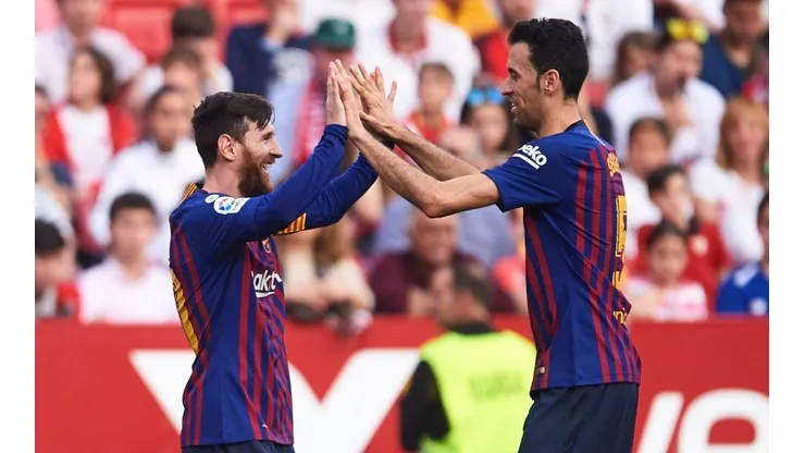 Lionel Messi (left) and Sergio Busquets.