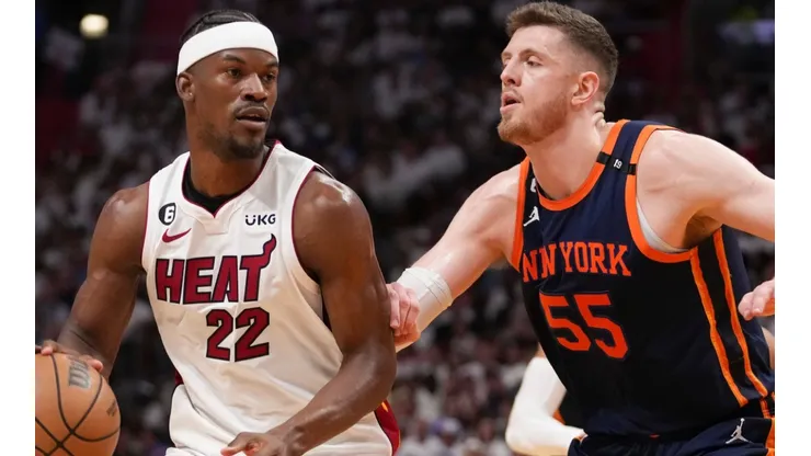 Jimmy Butler of the Miami Heat and Isaiah Hartenstein of the New York Knicks