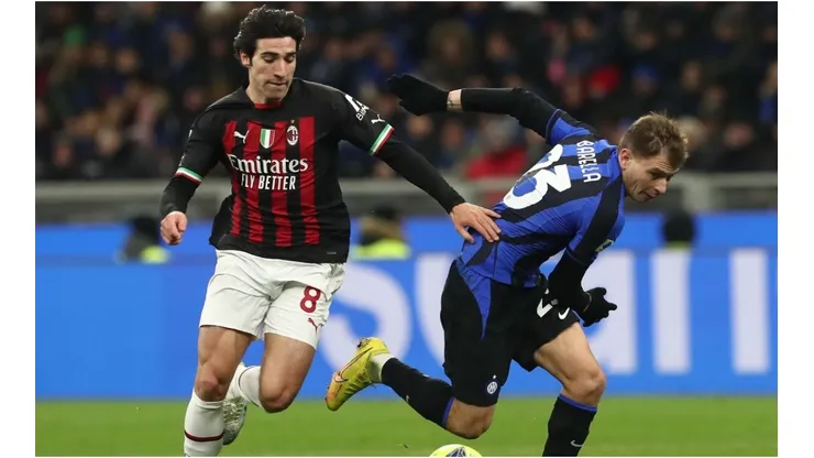 Sandro Tonali of AC Milan competes for the ball with Nicolo’ Barella of FC Internazionale