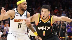 Bruce Brown of the Denver Nuggets and Devin Booker of the Phoenix Suns