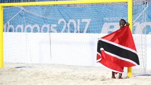 Young trinidadian with the flag of Trinidad and Tobago