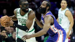 Jaylen Brown #7 of the Boston Celtics looks to pass against James Harden #1 of the Philadelphia 76ers