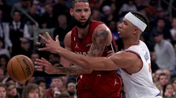 Caleb Martin #16 of the Miami Heat tries to pass as Josh Hart #3 of the New York Knicks